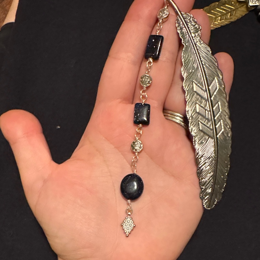 Elegant Silver and Blue Feather Pendant bookmark